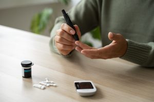 side-view-diabetic-woman-checking-her-glucose-level