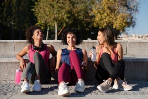 full-shot-smiley-women-outdoors_23-2149161250